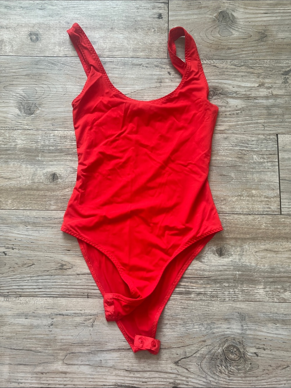 Zara’s Bright Red One-Piece Bodysuit